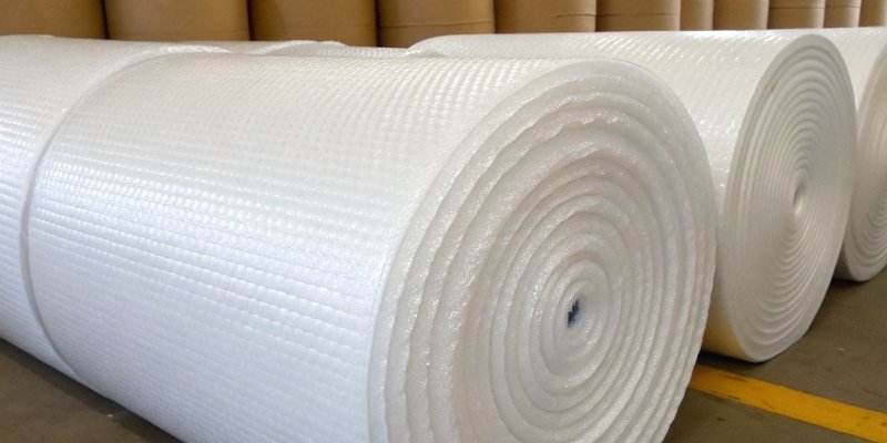 Rolls of white polyethylene (PE) foam used for packaging applications