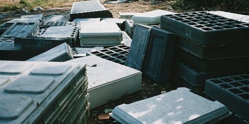 A pile of scrapped, defective PU foam parts